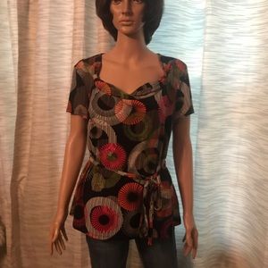 Black colorful blouse.